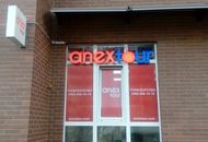 Вывеска для ANEX Tour — вид снаружи здания